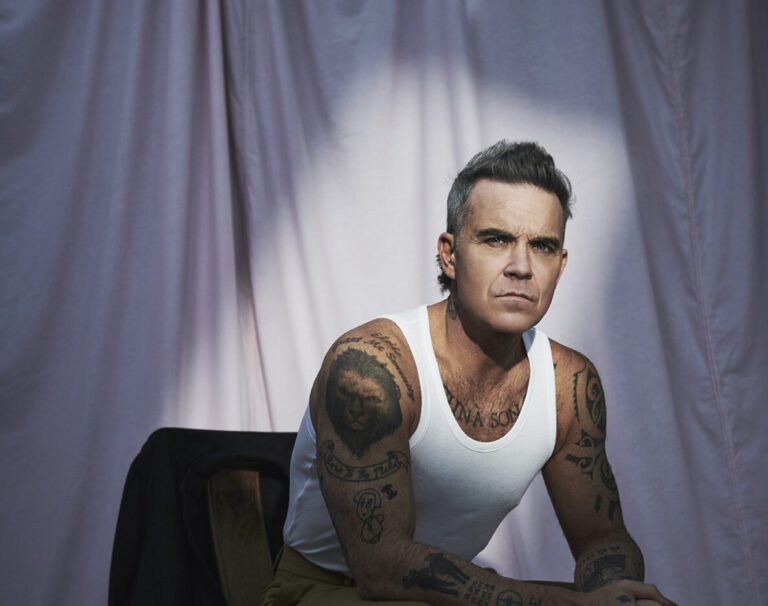 Robbie-Williams-Credit-Jason-Hetherington-1186x936